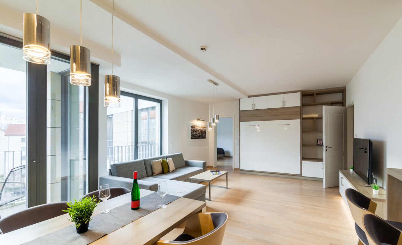 2-zimmer-komfort-wohnzimmer-bett